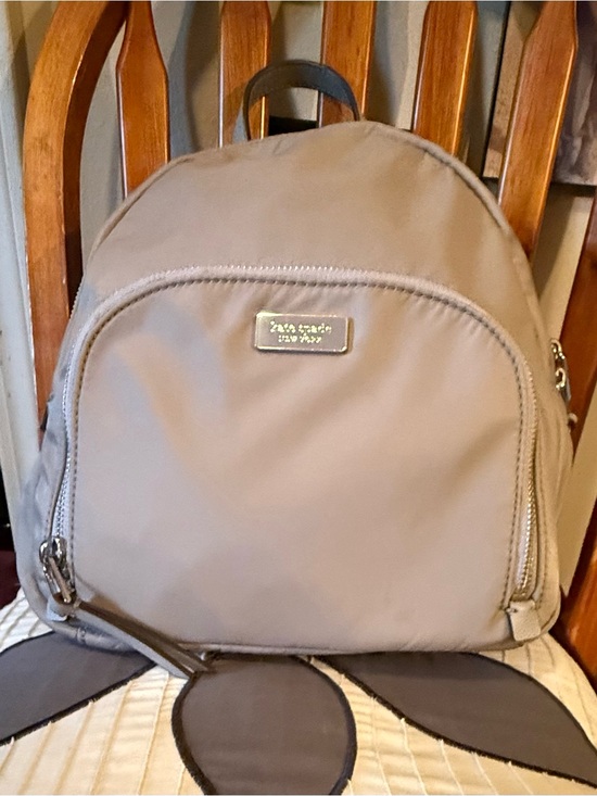 kate spade Handbags - KATE SPADE NEW YORK taupe nylon medium sized backpack with gold logo plaque. 💕